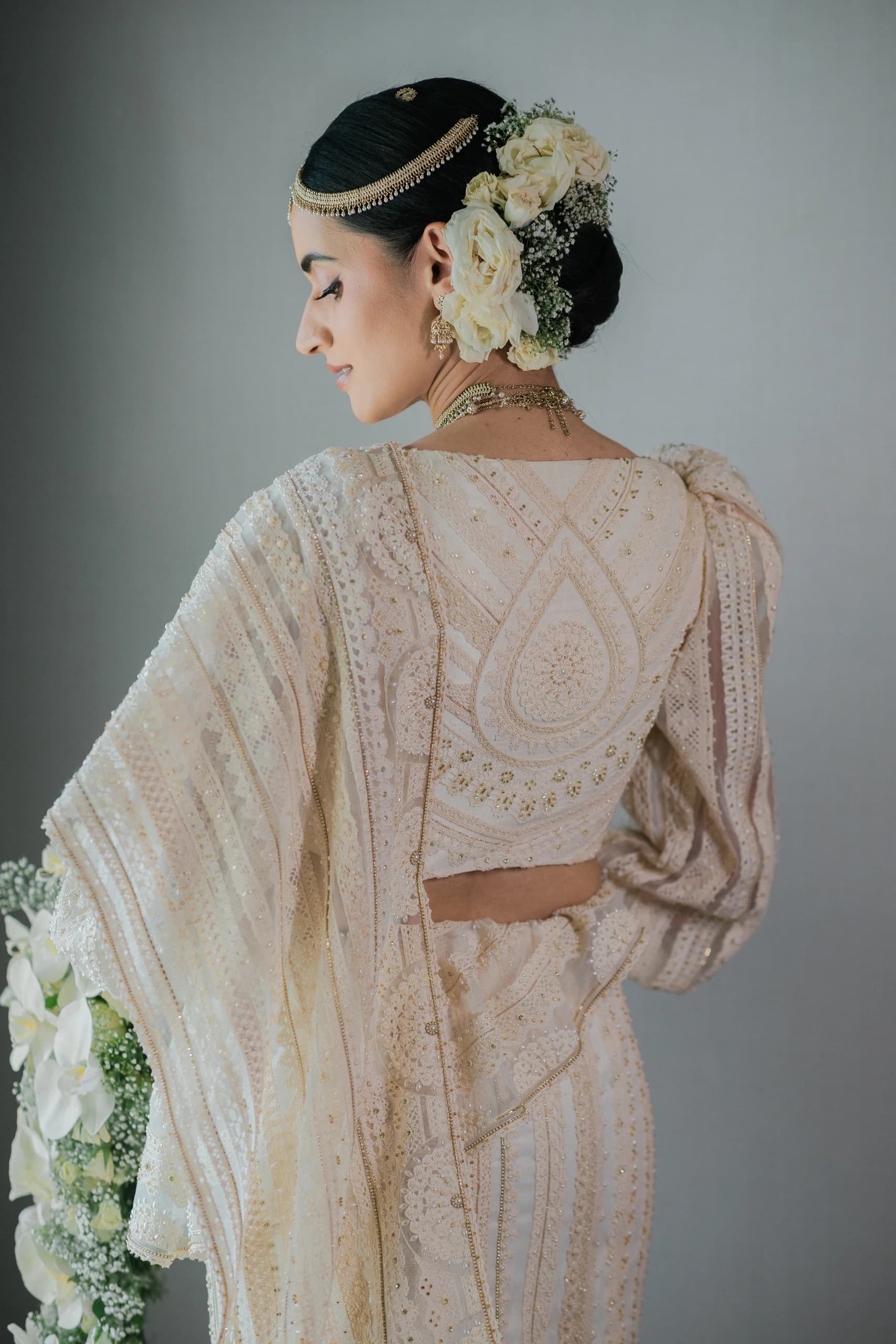 Handcrafted bridal blouse and ornate back embroidery